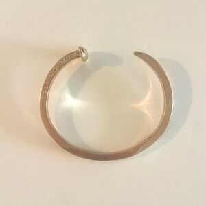 Giles & Brother skinny railroad spike cuff bracelet. Polished gold